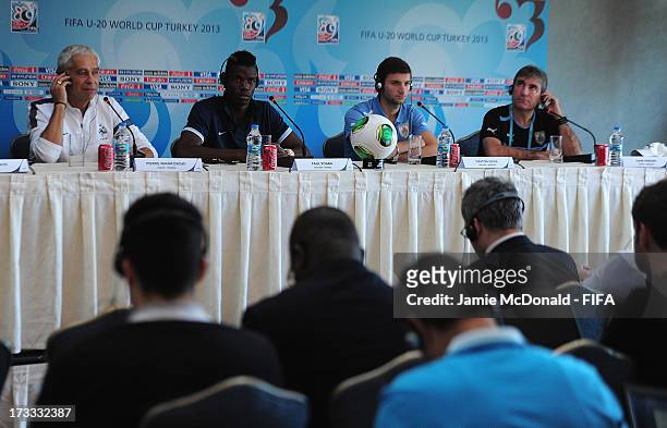The captain and coach of Uruguay Juan Verzeri and Gaston Silva and Paul Pogba and Pierre Mankowski the captain and coach of France talk to the media...