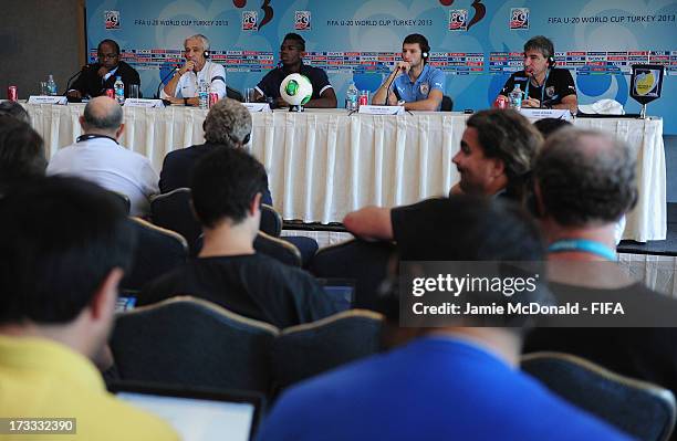 The captain and coach of Uruguay Juan Verzeri and Gaston Silva and Paul Pogba and Pierre Mankowski the captain and coach of France talk to the media...