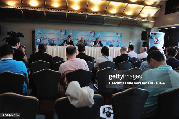 Servet Yardimci, President of the Local Organising Committee and Jim Boyce, Chairman of the FIFA Organising Committee tals to the media during a FIFA...