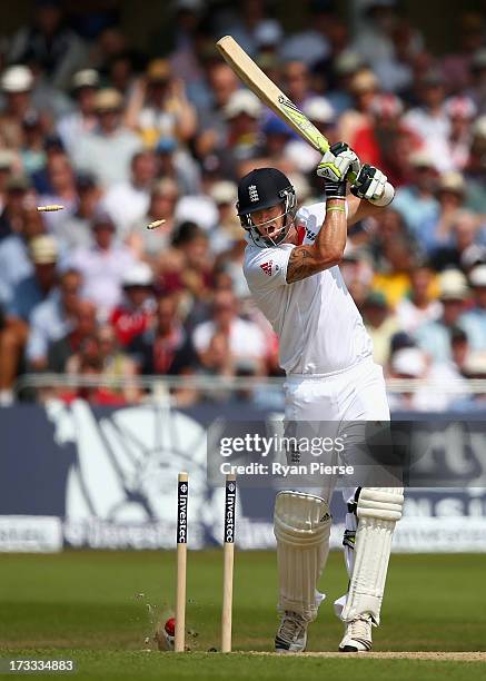 Kevin Pietersen of England is bowled by James Pattinson of Australia during day three of the 1st Investec Ashes Test match between England and...