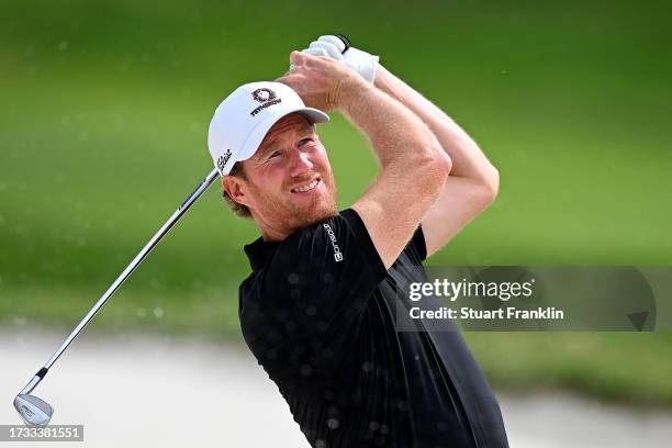 Wil Besseling of Netherlands plays out of a bunker on the 16th hole on Day Two of the acciona Open de Espana presented by Madrid at Club de Campo...