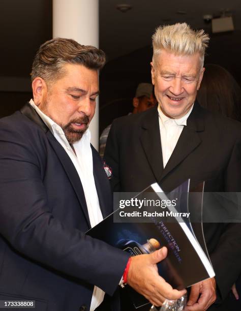 Flaunt Magazine Editor In Chief Luis Barajas and director/artist David Lynch attend Flaunt Magazine and David Lynch celebrate the Shared Releases Of...