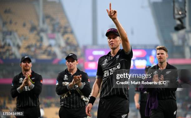 Trent Boult of New Zealand leads their side off at the end of the innings in which they took their 200th ODI wicket during the ICC Men's Cricket...