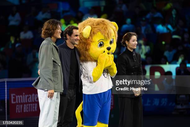 Zhang Zhizhen, Roger Federer and Li Na takes photo with a mascot at Federer's Fan Day on Day 12 of 2023 Shanghai Rolex Masters at Qi Zhong Tennis...
