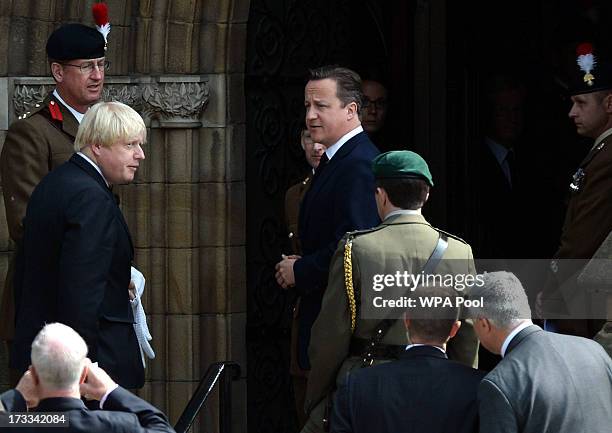 Mayor of London Boris Johnson and Prime Minister David Cameron arrive for the funeral service of Fusilier Lee Rigby at Bury Parish Church on July 12,...