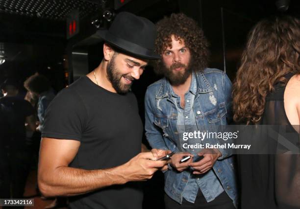 Actor Jesse Metcalfe and musician Andrew Stockdale of Wolfmother attend Flaunt Magazine and David Lynch celebrate the Shared Releases Of Context...