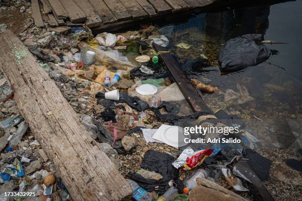 Garbage accumulates around the island due to a lack of efficient waste management on October 11, 2023 in Gardi Sugdub, Panama. Indigenous communities...