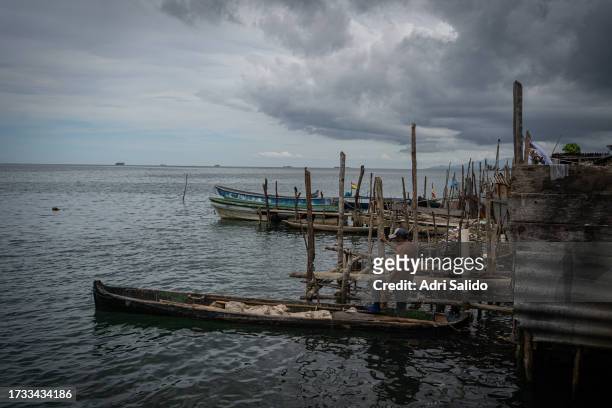 Fisherman prepares his boat on October 11, 2023 in Gardi Sugdub, Panama. Indigenous communities of the small island, located in an archipelago off...
