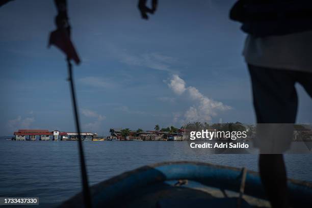 View of the island from a boat on October 12, 2023 in Kuna Yala, Panama. Indigenous communities of the small island, located in an archipelago off...