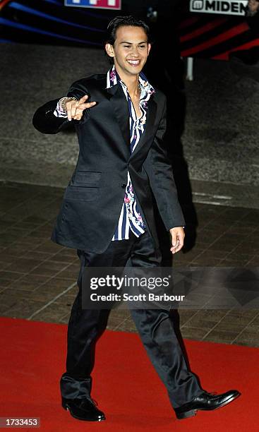 Singer Billy Crawford poses for photographers as he arrives at the 4th NRJ Music Awards 2003 at the Palais des Festivals January 18, 2003 in Cannes,...