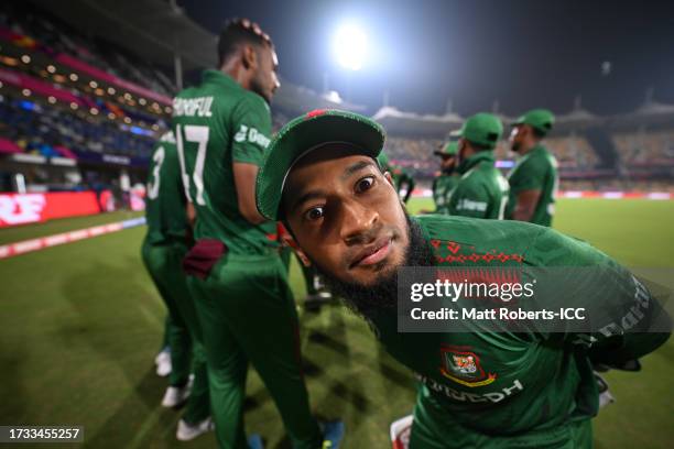 Mushfiqur Rahim of Bangladesh looks on from the huddle during the ICC Men's Cricket World Cup India 2023 between New Zealand and Bangladesh at MA...