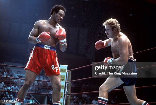 George Foreman looks to throw a punch against Scott LeDoux during the fight at the Utica Memorial Auditorium in Utica, New York. George Foreman won...