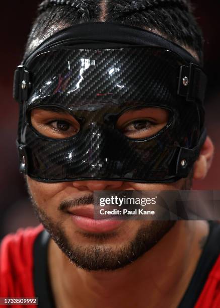 Keanu Pinder of the Wildcats looks on from the bench during the round three NBL match between Perth Wildcats and Melbourne United at RAC Arena, on...