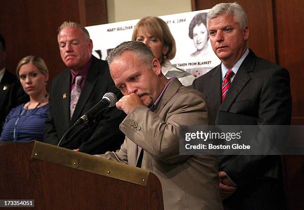 Casey Sherman, nephew of murder victim Mary Sullivan, reacts emotionally at the press conference. Behind him is Donald Hayes, Director of the Boston...