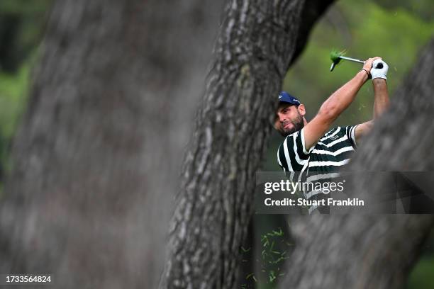 Adri Arnaus of Spain plays a shot on the fourth hole on Day Two of the acciona Open de Espana presented by Madrid at Club de Campo Villa de Madrid on...