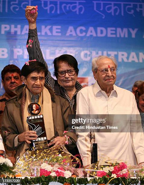 Bollywood actors Dev Anand, Manoj Kumar and Pran at the felicitation of Dev Anand on Dadasaheb Phalke Awards Ceremony at Bhaidas Hall, Vile Parle on...
