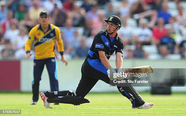 Durham batsman Phil Mustard hits out during the Friends Life T20 match between Durham Dynamos and Yorkshire Carnegie at Emirates Durham ICG on July...