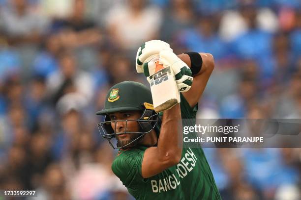 Bangladesh's Mahmudullah plays a shot during the 2023 ICC Men's Cricket World Cup one-day international match between India and Bangladesh at the...