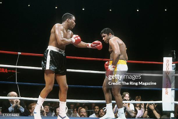 Tim Witherspoon throws a punch against Greg Page during the fight at Convention Center in Las Vegas, Nevada. Tim Witherspoon won the vacant WBC...