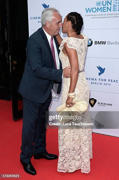 Hans-Rainer Schroeder and Barbara Becker arrive for the Cinema for Peace UN women honorary dinner at Soho House on July 12, 2013 in Berlin, Germany.
