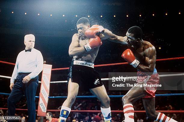 Evander Holyfield lands a punch against Lionel Byarm during the fight at Madison Square Garden in New York, New York. Evander Holyfield won by a UD...