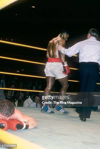 Mike Tyson walks to his corner after knocking out Steve Zouski during the fight at Nassau Coliseum in Uniondale, New York. Mike Tyson won by a KO 3.
