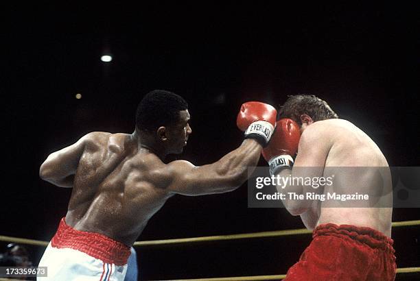 Mike Tyson lands an uppercut against Steve Zouski during the fight at Nassau Coliseum in Uniondale, New York. Mike Tyson won by a KO 3.