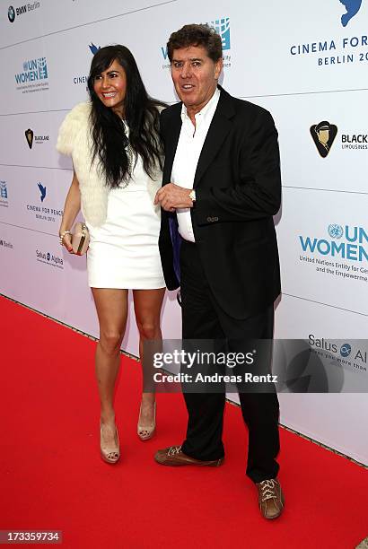 Raffaela Slyusareva and Jack White arrive for the Cinema for Peace UN women honorary dinner at Soho House on July 12, 2013 in Berlin, Germany.