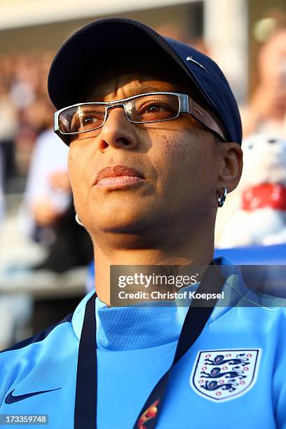 Head coach Hope Powell of England stands up for the national anthem prior to the UEFA Women's EURO 2013 Group C match between England and Spain at...