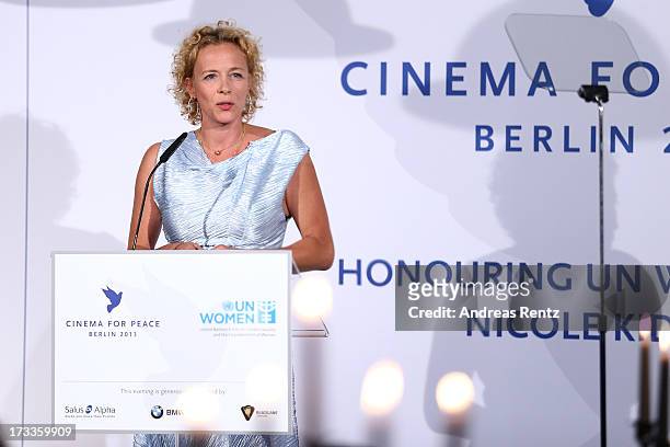 Katja Riemann attends the Cinema for Peace UN women charity dinner at Soho House on July 12, 2013 in Berlin, Germany.