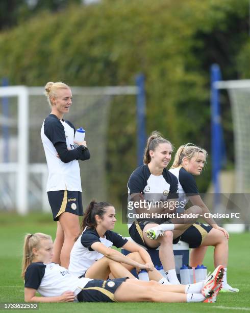 Aggie Beever-Jones, Cerys Brown, Niamh Charles, Sophie Ingle, and Erin Cuthbert of Chelsea look on during a Chelsea FC Women's Training Session at...