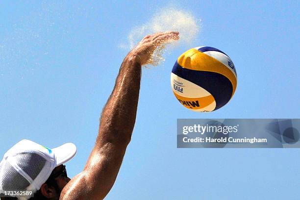 Brazil's Bruno Oscar Schmidt attacks during the Schmidt Pedro-Bruno v Sidorenko-Dyachenko game as part of the FIVB Gstaad Grand Slam fourth day on...