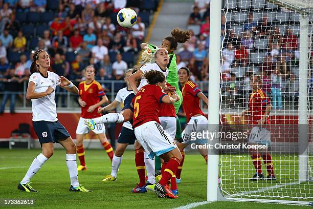 Ainhoa Tirapu of Spain saves against Stephanie Houghton of England during the UEFA Women's EURO 2013 Group C match between England and Spain at...