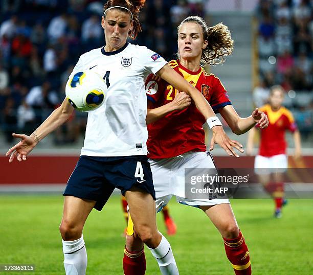 England's Jill Scott vies for the ball with Spain's Irene Paredesi during the UEFA Women's EURO 2013 group C soccer match between England and Spain...