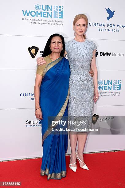 Lakshmi Puri and Nicole Kidman arrives for the Cinema for Peace UN women honorary dinner at Soho House on July 12, 2013 in Berlin, Germany.