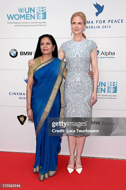 Lakshmi Puri and Nicole Kidman arrives for the Cinema for Peace UN women honorary dinner at Soho House on July 12, 2013 in Berlin, Germany.