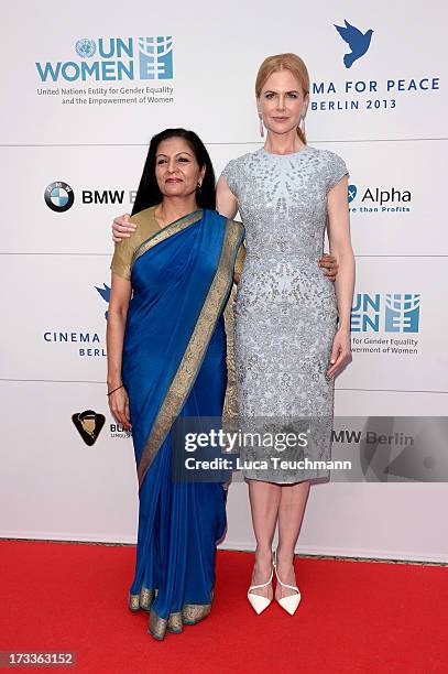 Lakshmi Puri and Nicole Kidman arrives for the Cinema for Peace UN women honorary dinner at Soho House on July 12, 2013 in Berlin, Germany.