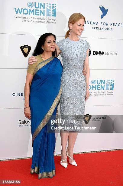 Lakshmi Puri and Nicole Kidman arrives for the Cinema for Peace UN women honorary dinner at Soho House on July 12, 2013 in Berlin, Germany.