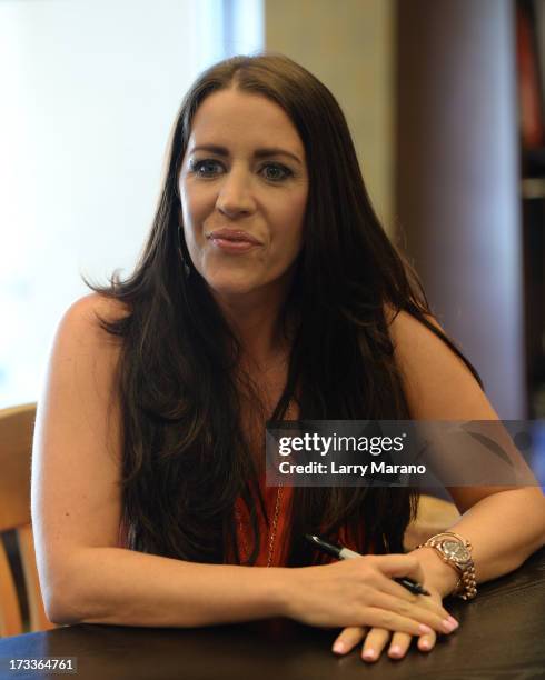 Pattie Mallette signs copies of "Nowhere But Up" at Barnes & Noble on July 12, 2013 in Fort Lauderdale, Florida.