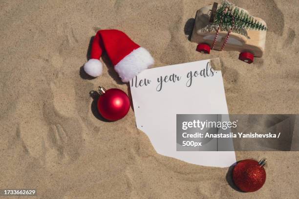 high angle view of christmas decorations on table - table font view stock pictures, royalty-free photos & images