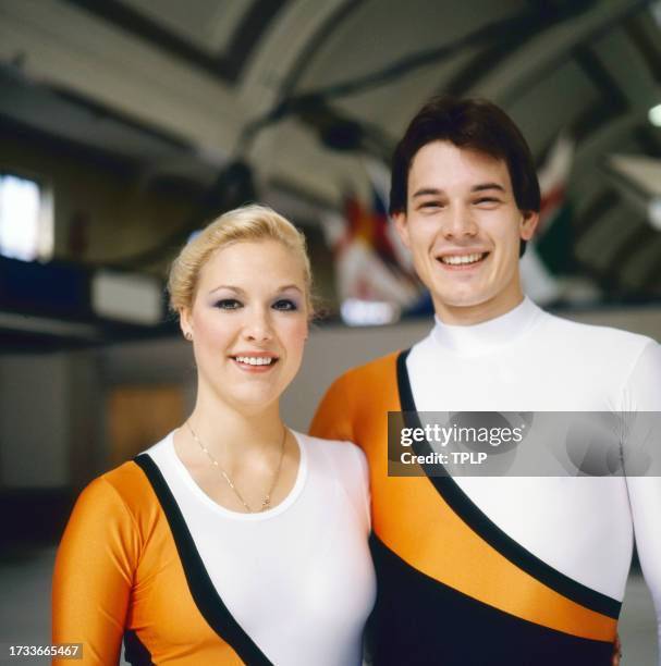 Portrait of Canadian pairs figure skaters Marianne Van Bommel and Wayne Deweyert as they pose on an ice rink, Helsinki, Finland, September 26, 1983....