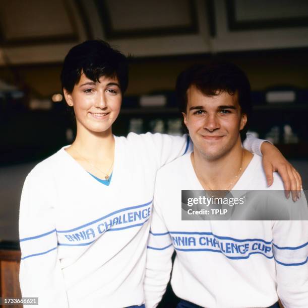Portrait of Canadian pairs figure skaters Melina Kunhegyi and Lyndon Johnston as they pose on an ice rink, Helsinki, Finland, September 26, 1983. The...