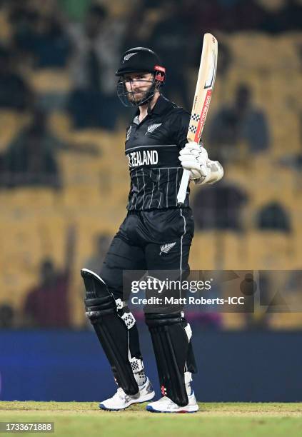 Kane Williamson of New Zealand celebrates their half century during the ICC Men's Cricket World Cup India 2023 between New Zealand and Bangladesh at...