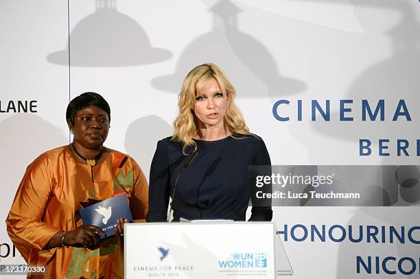 Fatou Bensouda and Veronica Ferres attend the Cinema for Peace UN women honorary dinner at Soho House on July 12, 2013 in Berlin, Germany.