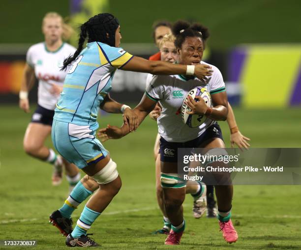 Grace Moore of Ireland is tackled by Symbat Zhamankulova of Kazakhstan during the WXV 3 2023 match between Ireland and Kazakhstan at The Sevens...