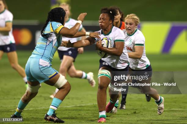 Grace Moore of Ireland is tackled by Symbat Zhamankulova of Kazakhstan during the WXV 3 2023 match between Ireland and Kazakhstan at The Sevens...