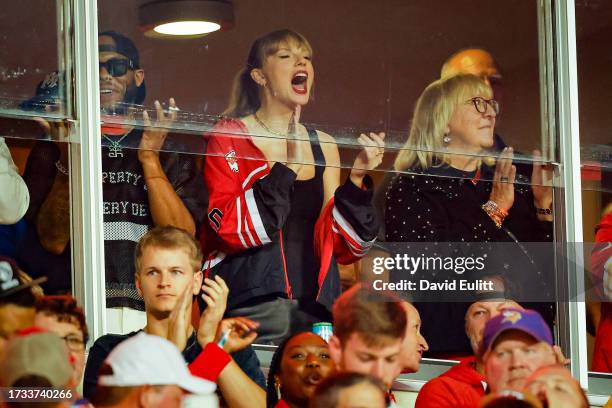 Taylor Swift and Donna Kelce applaud before the game between the Kansas City Chiefs and the Denver Broncos at GEHA Field at Arrowhead Stadium on...