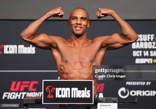 Edson Barboza of Brazil poses on the scale during the UFC Fight Night weigh-in at UFC APEX on October 13, 2023 in Las Vegas, Nevada.