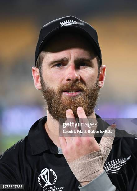 Kane Williamson of New Zealand looks on with a bandage on their hand following the ICC Men's Cricket World Cup India 2023 between New Zealand and...