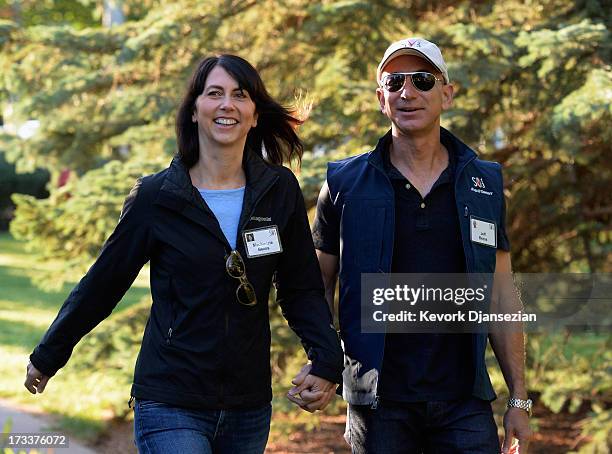 Jeff Bezos, founder and CEO Amazon.com, and his wife Mackenzie Bezos arrives for the Allen & Co., arrives to the Allen & Co. Annual conference July...